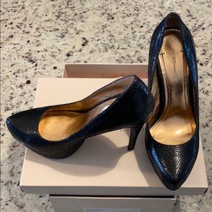 BCBGeneration Black Snake Parade Pumps size 9M